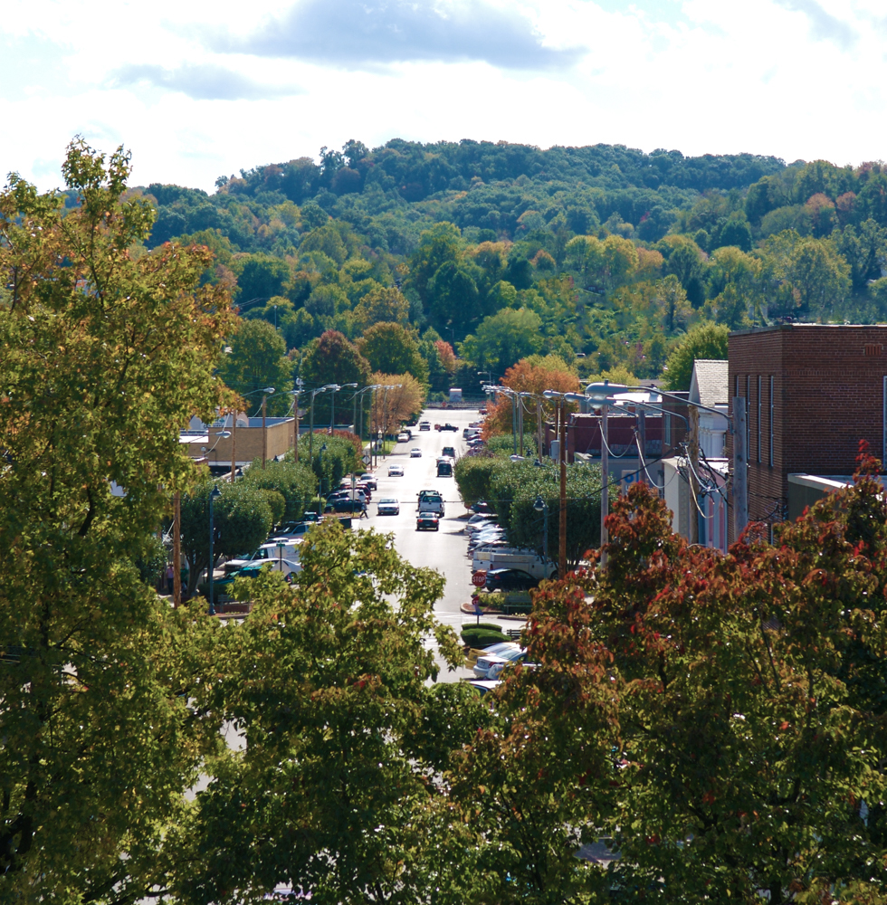 Downtown Parkersville is a quaint, peaceful mountain town surrounded by lush greenery and fresh mountain air.